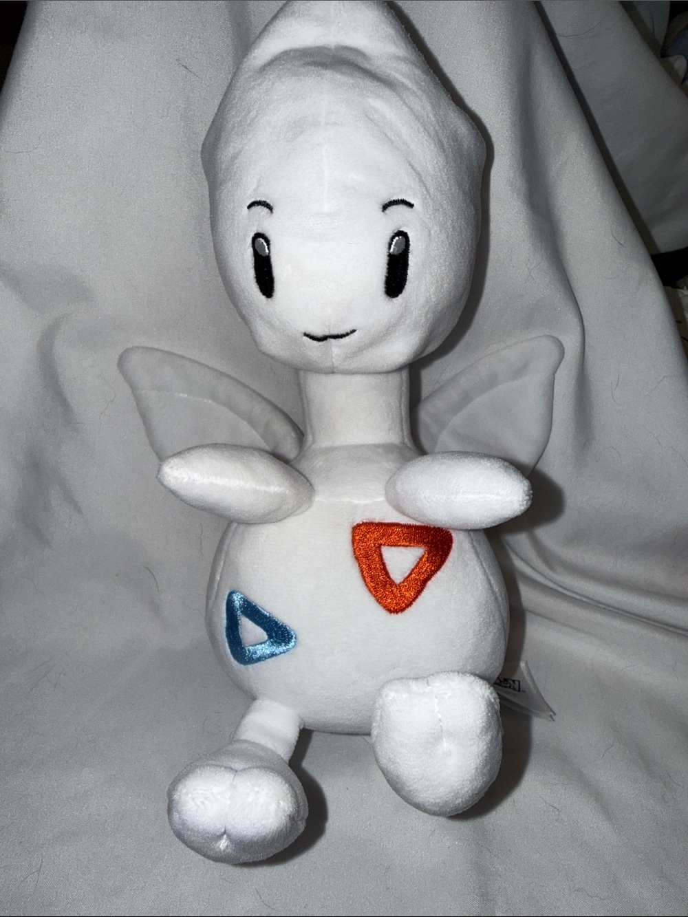Pokemon White Plush with Blue and Orange Triangle Accents